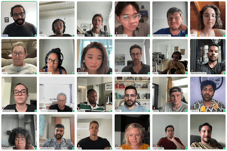 Grid of distributed Cosmos Video teammates on video call across different devices and locations